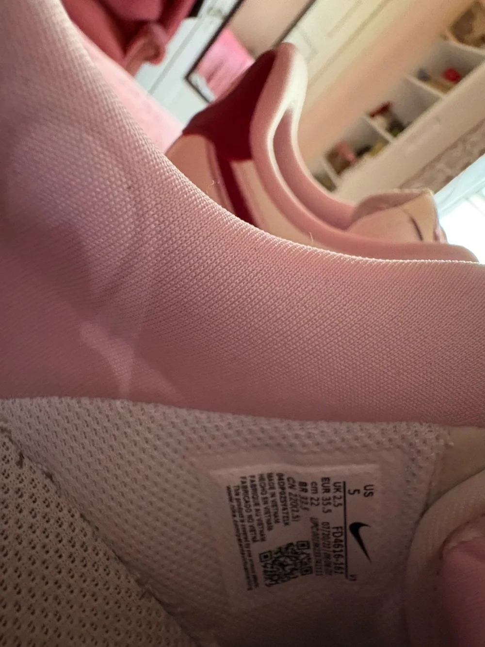 Nike Kids White and Pink Low-Top Sneakers with Maroon Swoosh